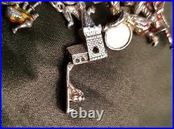 Vintage c1964 925 Sterling Silver Charm Bracelet, 24 charms D&BS Bham