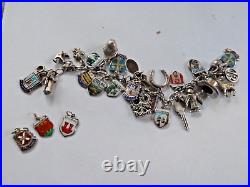 Vintage german 800/english sterling silver charm bracelet & 29 charms/badges