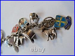 Vintage german 800/english sterling silver charm bracelet & 29 charms/badges