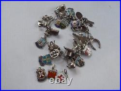 Vintage german 800/english sterling silver charm bracelet & 29 charms/badges