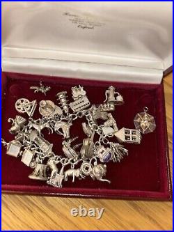 Vintage loaded Sterling Silver Charm Bracelet with Heart padlock and Charms