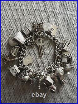 Vintage loaded Sterling Silver Charm Bracelet with Heart padlock and Charms