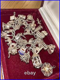 Vintage loaded Sterling Silver Charm Bracelet with Heart padlock and Charms