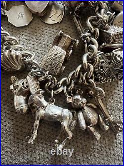 Vintage loaded Sterling Silver Charm Bracelet with Heart padlock and Charms