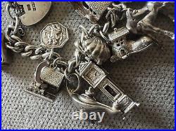 Vintage loaded Sterling Silver Charm Bracelet with Heart padlock and Charms