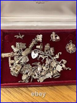 Vintage loaded Sterling Silver Charm Bracelet with Heart padlock and Charms