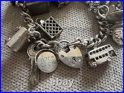 Vintage loaded Sterling Silver Charm Bracelet with Heart padlock and Charms