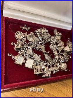 Vintage loaded Sterling Silver Charm Bracelet with Heart padlock and Charms