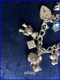 Vintage silver 925 bracelet 14 charms some rare with lock and safety chain 54.5g