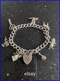 Vintage silver charm bracelet with charms