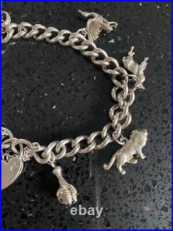 Vintage silver charm bracelet with charms