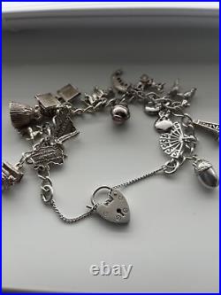 Vintage silver charm bracelet with charms
