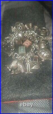 Vintage silver charm bracelet with charms
