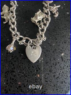 Vintage silver charm bracelet with charms