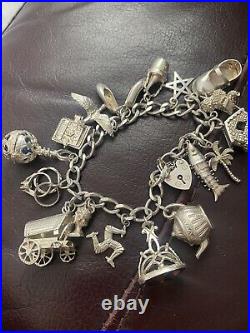 Vintage solid silver charm bracelet