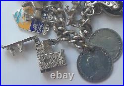 Vintage sterling silver bracelet with charms and padlock, hallmarked