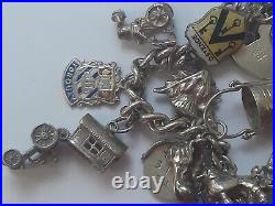 Vintage sterling silver bracelet with charms and padlock, hallmarked