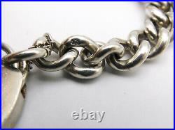Vintage sterling silver charm bracelet graduated curb links 7.75 inches