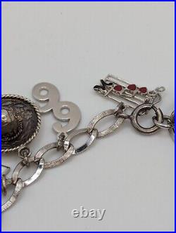 Vintage sterling silver charm bracelet loaded 49.1 g total weight wearable