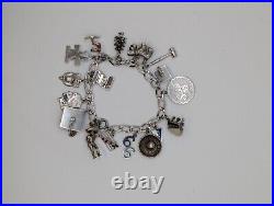 Vintage sterling silver charm bracelet loaded 49.1 g total weight wearable