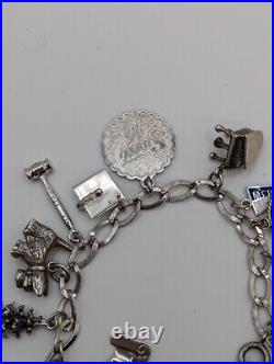 Vintage sterling silver charm bracelet loaded 49.1 g total weight wearable