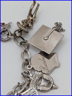 Vintage sterling silver charm bracelet loaded 49.1 g total weight wearable