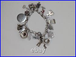 Vintage sterling silver charm bracelet loaded 49.1 g total weight wearable