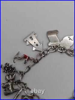 Vintage sterling silver charm bracelet loaded 49.1 g total weight wearable