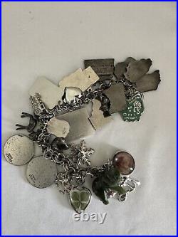 Vintage sterling silver charm bracelet loaded With 30 Charms 79.83g
