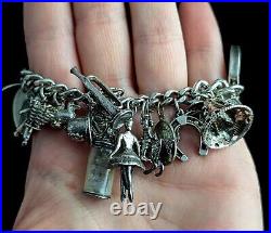 Vintage sterling silver charm bracelet, loaded, heavy