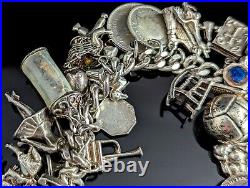 Vintage sterling silver charm bracelet, loaded, heavy