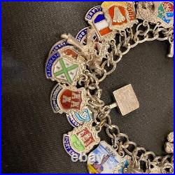 Vintage sterling silver charm bracelet with approx 40 vintage enamel charms