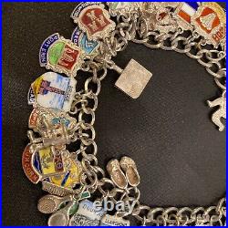 Vintage sterling silver charm bracelet with approx 40 vintage enamel charms