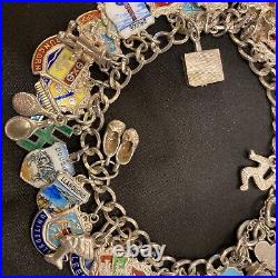 Vintage sterling silver charm bracelet with approx 40 vintage enamel charms