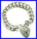 Vintage-sterling-silver-chunky-charm-bracelet-7-1-4-inches-long-London-1971-01-pe