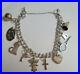 Vtg-James-Avery-Sterling-Silver-Bracelet-With-Retired-Sterling-Silver-Charms-01-anoz