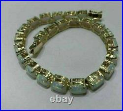 Women's Tennis Bracelet 14k Yellow Gold Finish 10 Ct Oval Cut Lab Created Opal