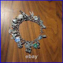 World traveler charm bracelet solid silver, fully loaded