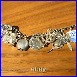 World traveler charm bracelet solid silver, fully loaded