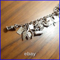 World traveler charm bracelet solid silver, fully loaded